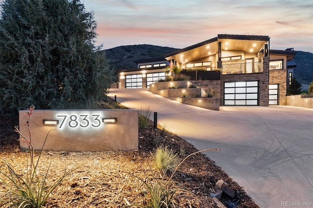 exterior space featuring a mountain view and a garage