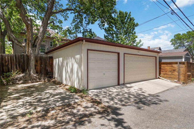 detached garage with fence