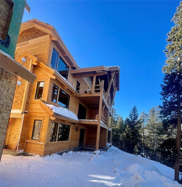 view of snow covered property