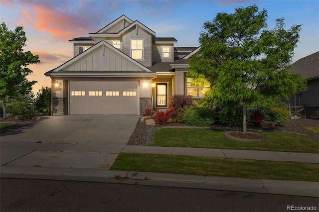 5077 W 108th Cir, Westminster, CO 80031 - craftsman-style house with board and batten siding, driveway, a garage, stone siding, and a yard