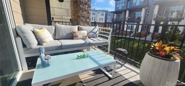 balcony with an outdoor hangout area