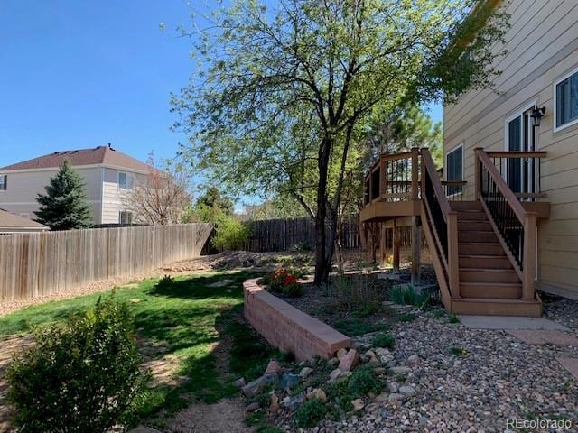 view of yard featuring a deck