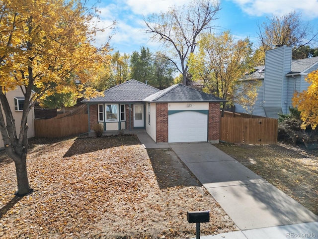 single story home featuring a garage