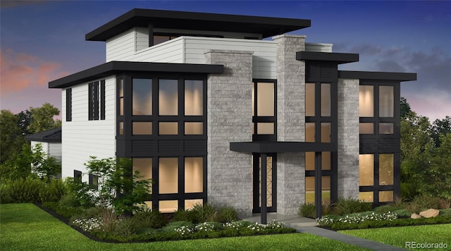 rear view of property featuring stone siding