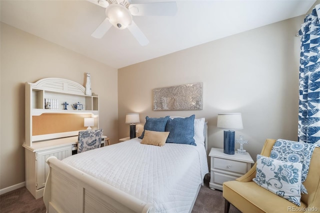 bedroom with dark carpet, baseboards, and ceiling fan