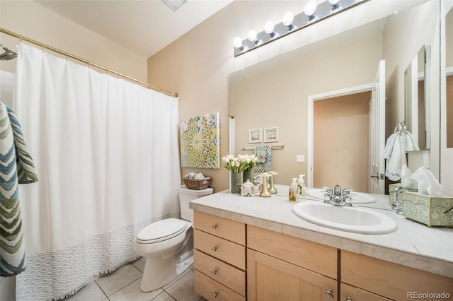 bathroom with tile patterned floors, vanity, toilet, and a shower with shower curtain