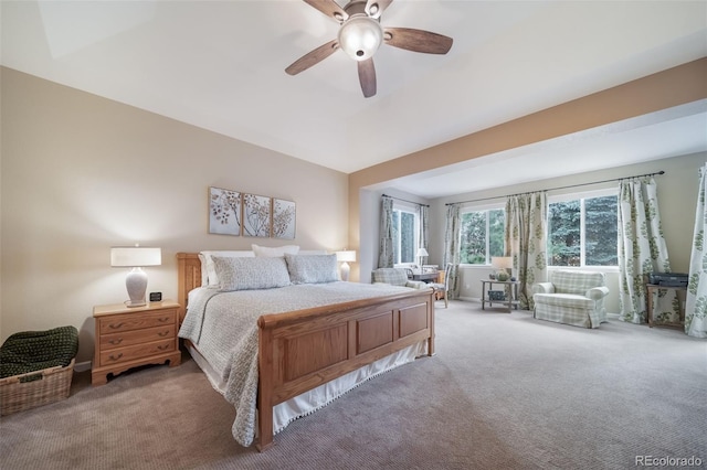 bedroom with a ceiling fan and carpet