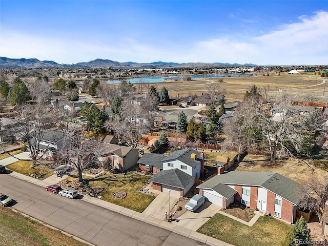 aerial view with a mountain view and a residential view