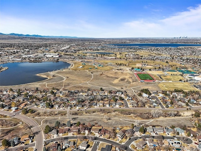 bird's eye view featuring a residential view and a water view