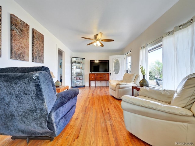 675 S Quivas St, Denver, CO 80223 - living area with a ceiling fan and light wood-type flooring