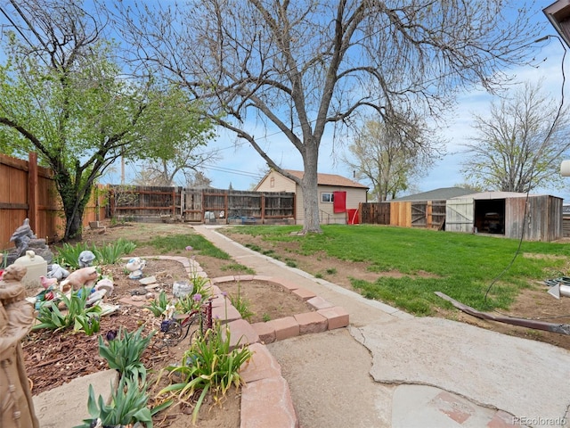 675 S Quivas St, Denver, CO 80223 - view of yard featuring an outdoor structure, a pole building, and fence