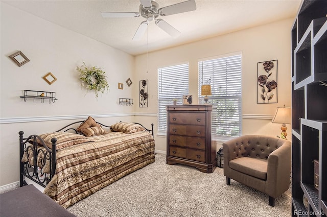 bedroom featuring carpet floors and ceiling fan