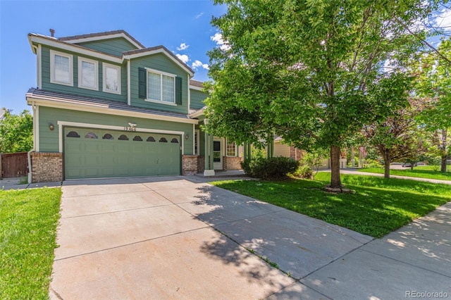 19466 E 59th Dr, Aurora, CO 80019 - view of front of house with brick siding, concrete driveway, a garage, and a front yard