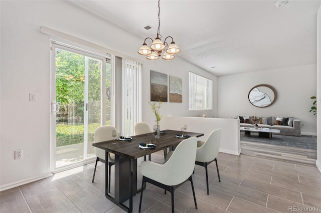 19466 E 59th Dr, Aurora, CO 80019 - dining room featuring plenty of natural light and a chandelier