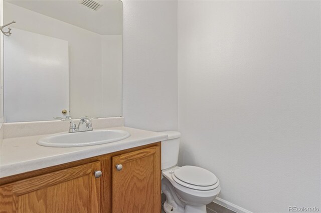 19466 E 59th Dr, Aurora, CO 80019 - bathroom with vanity and toilet