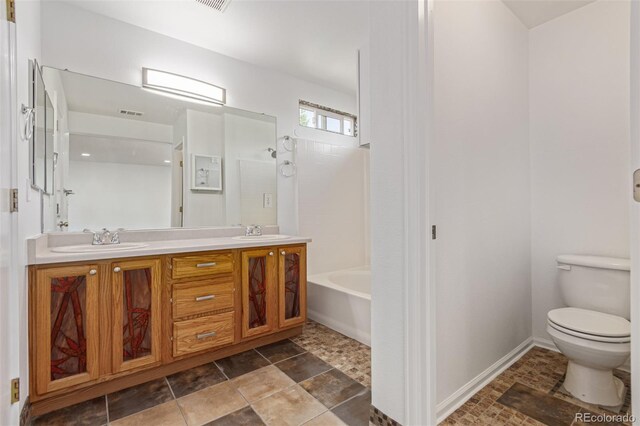 19466 E 59th Dr, Aurora, CO 80019 - full bath featuring double vanity and shower / bathtub combination
