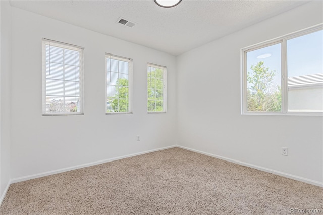 19466 E 59th Dr, Aurora, CO 80019 - carpeted spare room featuring baseboards
