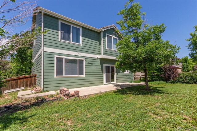 19466 E 59th Dr, Aurora, CO 80019 - back of house featuring a patio