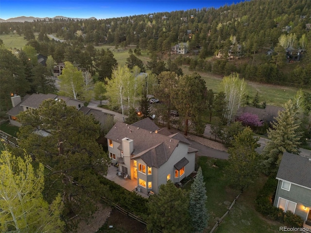 31402 N Bermuda Dunes Dr, Evergreen, CO 80439 - aerial view of property and surrounding area featuring a forest and mountains