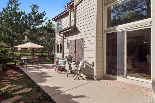 31402 N Bermuda Dunes Dr, Evergreen, CO 80439 - view of patio featuring outdoor dining space
