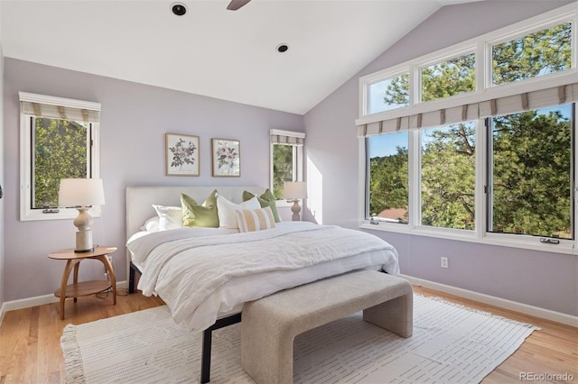 31402 N Bermuda Dunes Dr, Evergreen, CO 80439 - bedroom featuring light wood-style flooring and vaulted ceiling