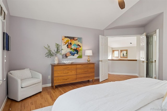 31402 N Bermuda Dunes Dr, Evergreen, CO 80439 - bedroom featuring wood finished floors, lofted ceiling, and a ceiling fan
