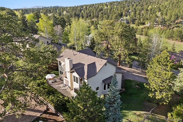 31402 N Bermuda Dunes Dr, Evergreen, CO 80439 - view of subject property featuring a forest