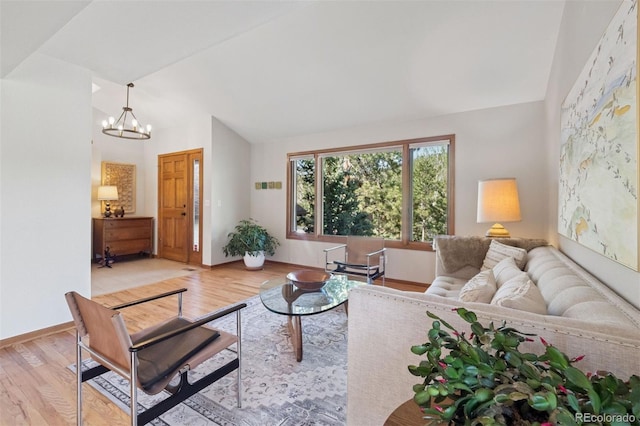 31402 N Bermuda Dunes Dr, Evergreen, CO 80439 - living area featuring lofted ceiling, light wood-style floors, and a chandelier