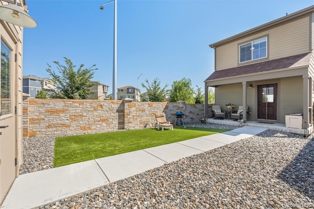 view of yard with fence