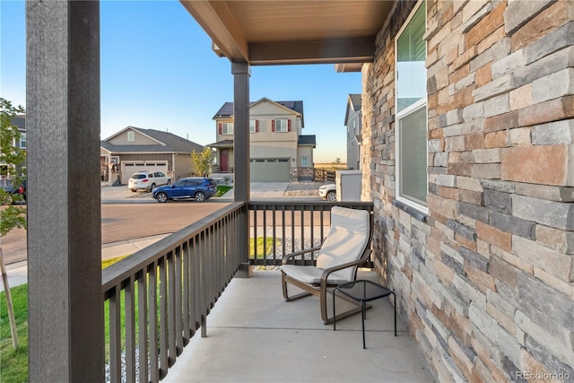 balcony featuring a porch