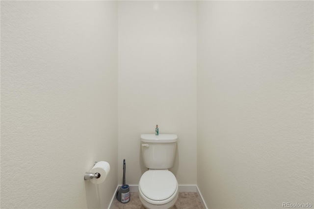 bathroom featuring toilet