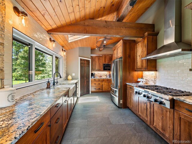 31756 Buffalo Park Rd, Evergreen, CO 80439 - kitchen featuring wall chimney range hood, appliances with stainless steel finishes, wood ceiling, brown cabinets, and backsplash