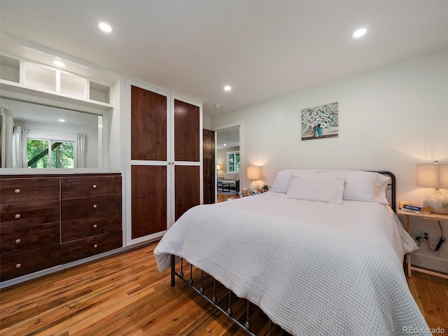 31756 Buffalo Park Rd, Evergreen, CO 80439 - bedroom featuring wood finished floors and recessed lighting