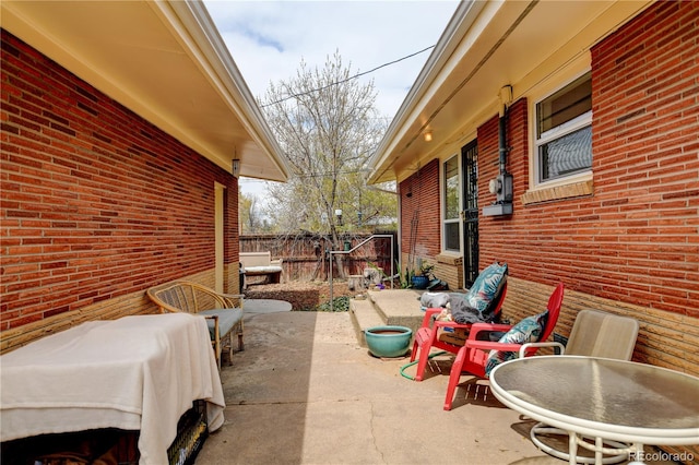 view of patio / terrace with fence