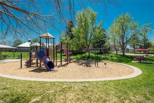 communal playground with a lawn