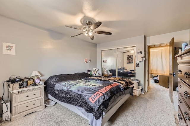 bedroom with light carpet, a ceiling fan, and a closet