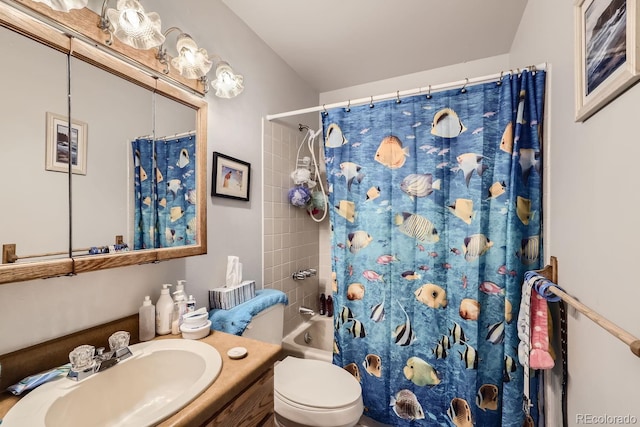 full bath with shower / tub combo, vanity, and toilet