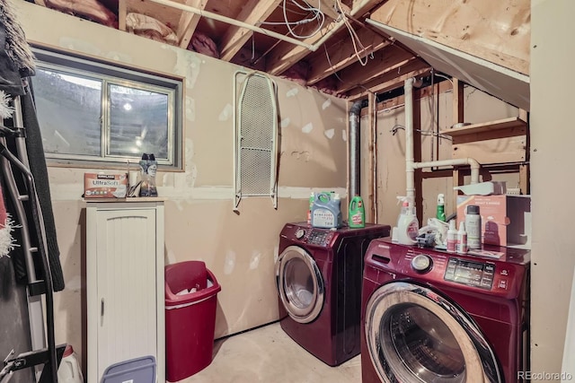 laundry room with laundry area and washer and clothes dryer