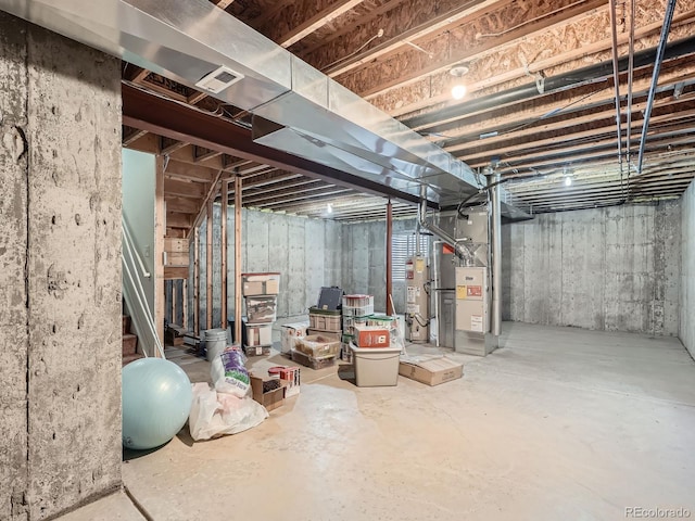 basement featuring water heater