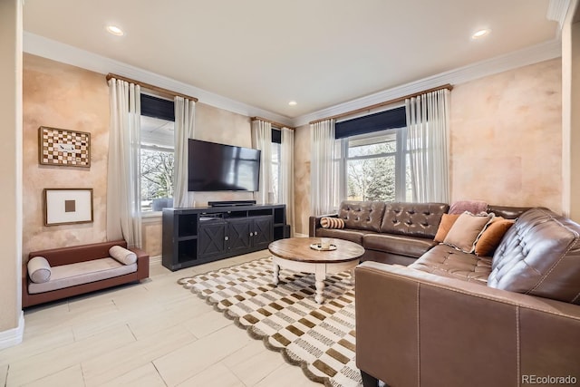 living room with ornamental molding, recessed lighting, and baseboards