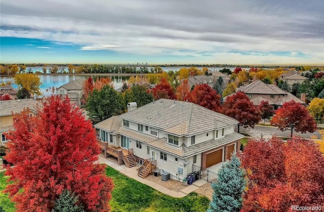 drone / aerial view with a water view