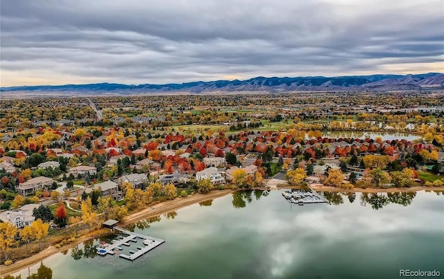 bird's eye view with a water and mountain view