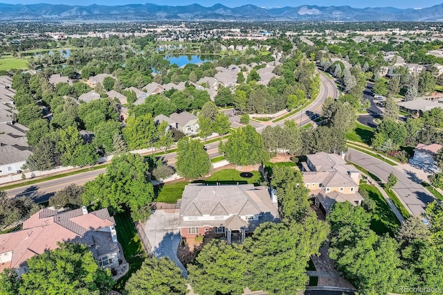 6790 W Crestline Ave, Littleton, CO 80123 - aerial view of property and surrounding area featuring nearby suburban area and a water and mountain view