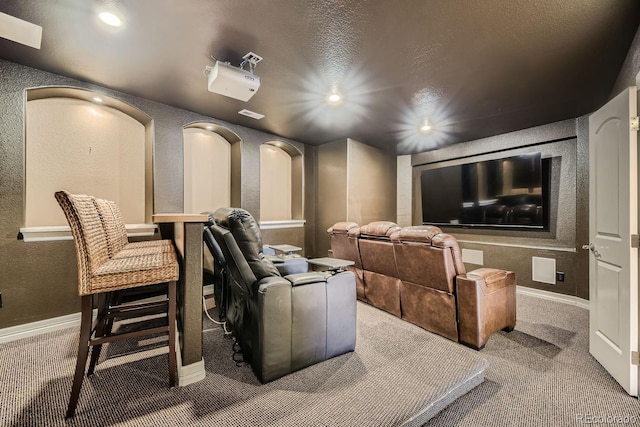 6790 W Crestline Ave, Littleton, CO 80123 - carpeted cinema room with a textured wall, recessed lighting, baseboards, and a textured ceiling