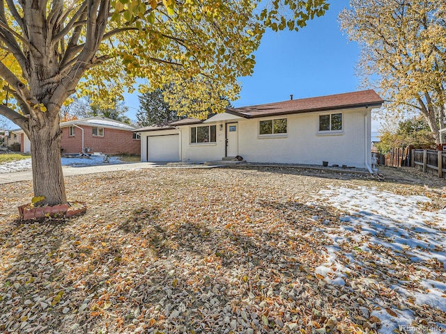 ranch-style home with a garage