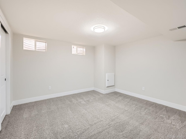 basement featuring carpet floors