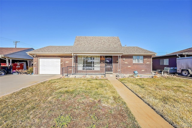 ranch-style home featuring a garage, a porch, and a front lawn