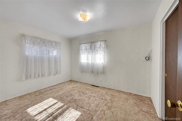 5621 Demott Ave, Commerce City, CO 80022 - empty room featuring light colored carpet