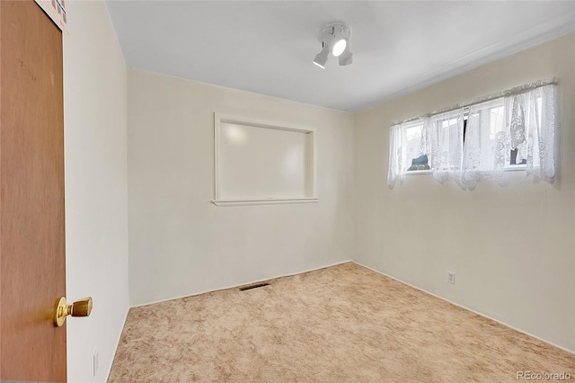 5621 Demott Ave, Commerce City, CO 80022 - empty room featuring carpet