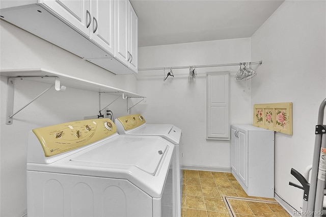 5621 Demott Ave, Commerce City, CO 80022 - laundry area with washing machine and dryer and cabinets